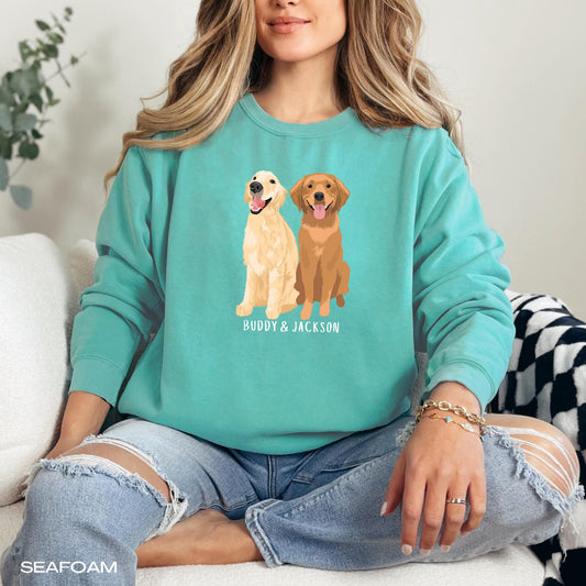 A young woman wearing a personalized Golden Retriever sweatshirt in color seafoam from Love Dogs Gifts