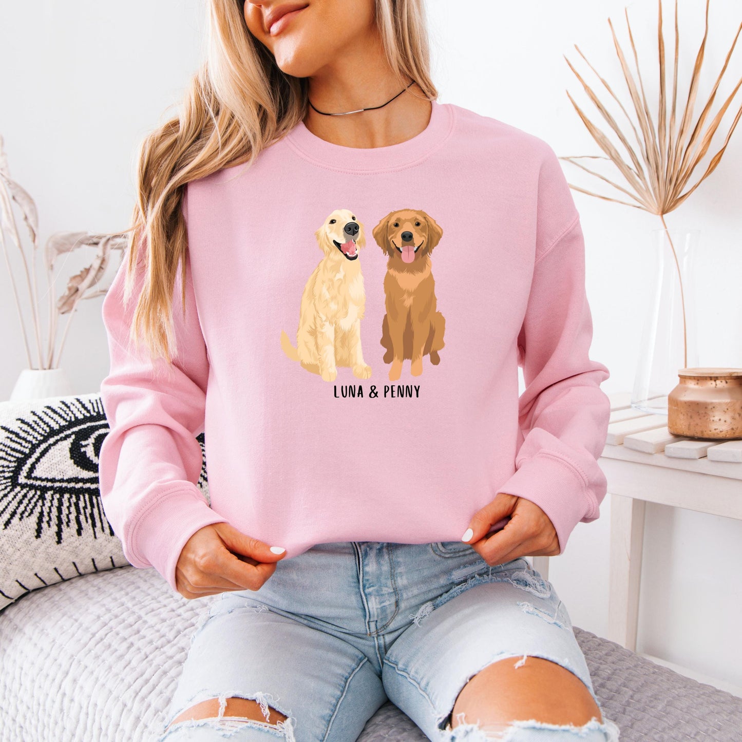 A woman wearing a personalized golden retriever sweatshirt