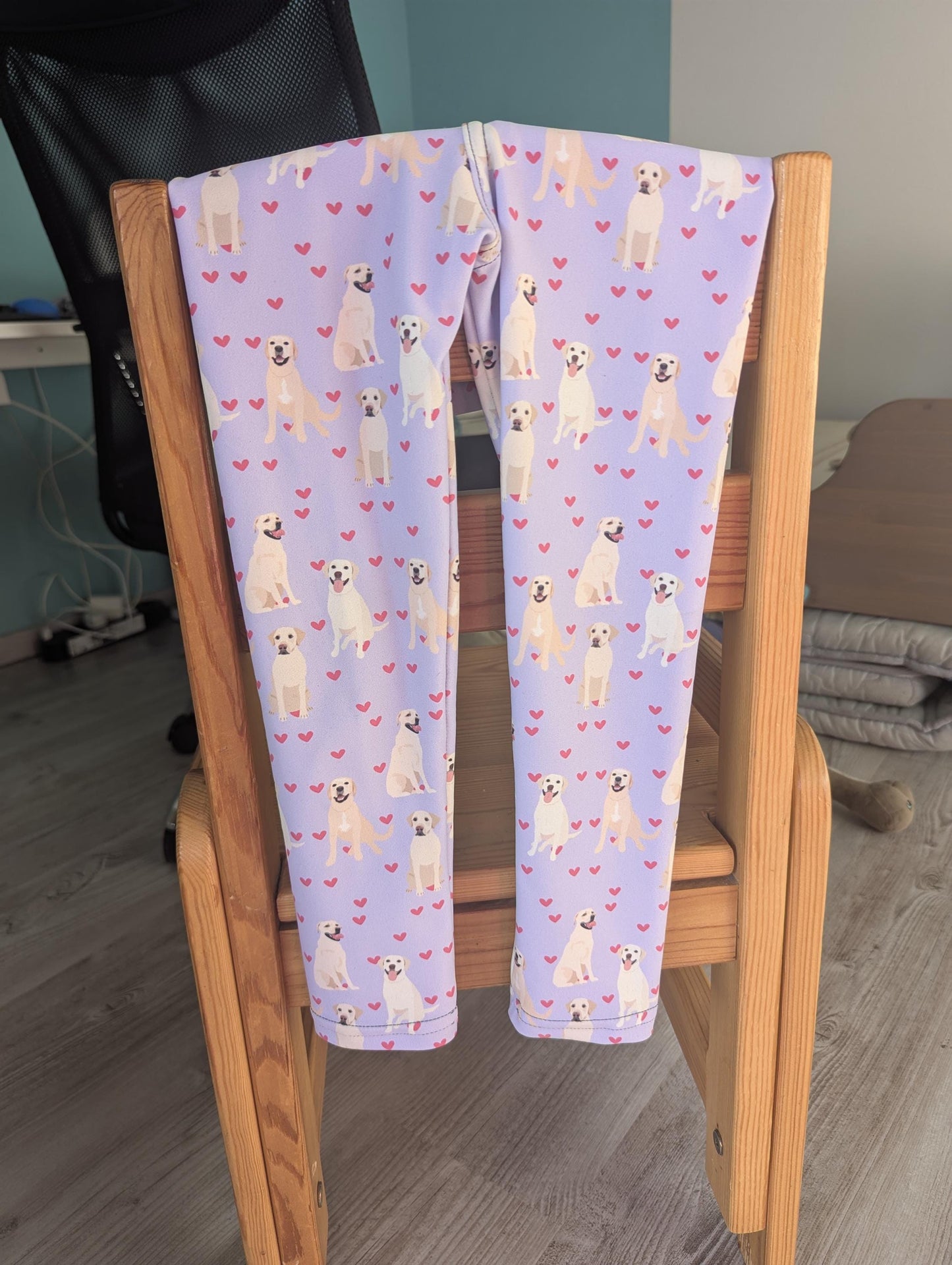 a flatlay view of a yellow labrador puppy leggings for kids