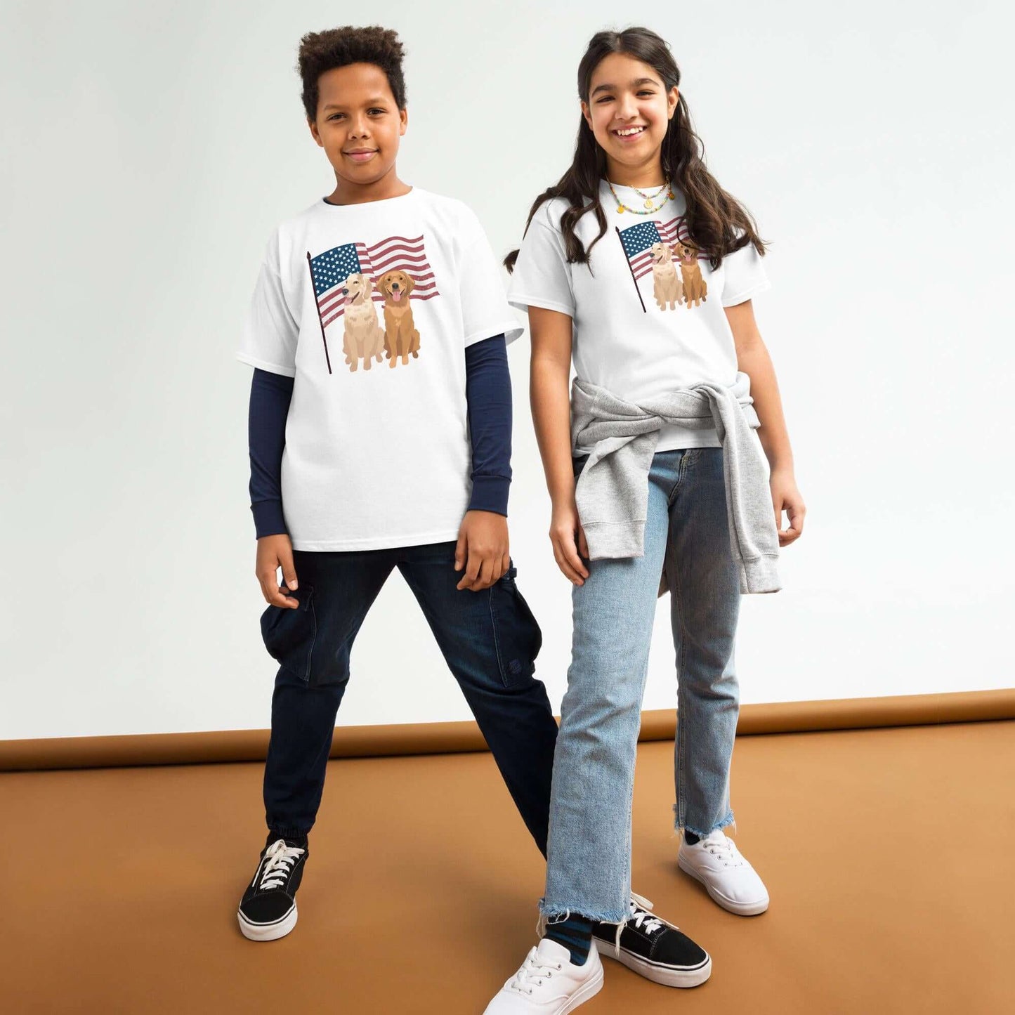 A young girl and a boy wearing 4th of July Golden Retriever youth t-shirt in color white.