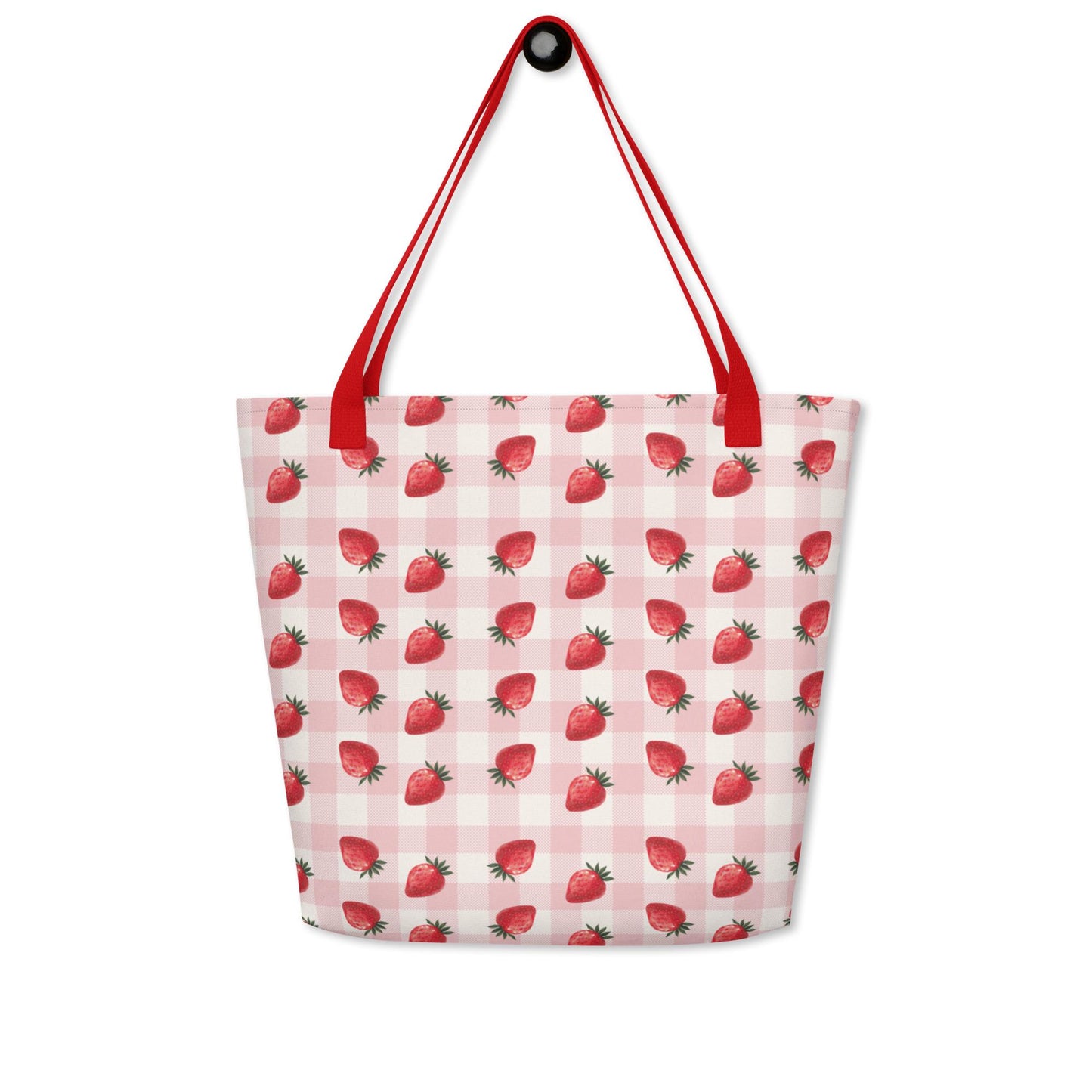Gingham strawberry summer tote bag hanged on a hook