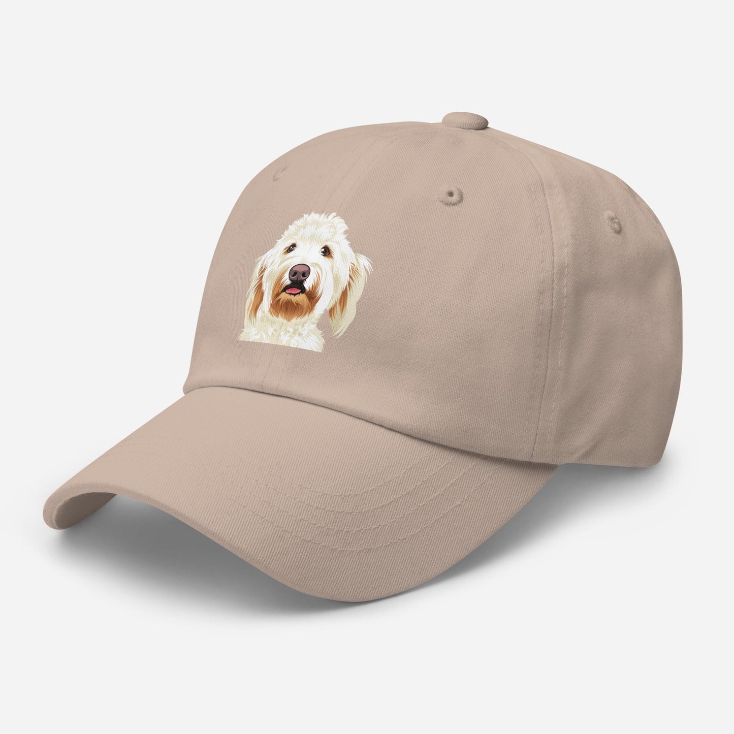 white goldendoodle hat in sand