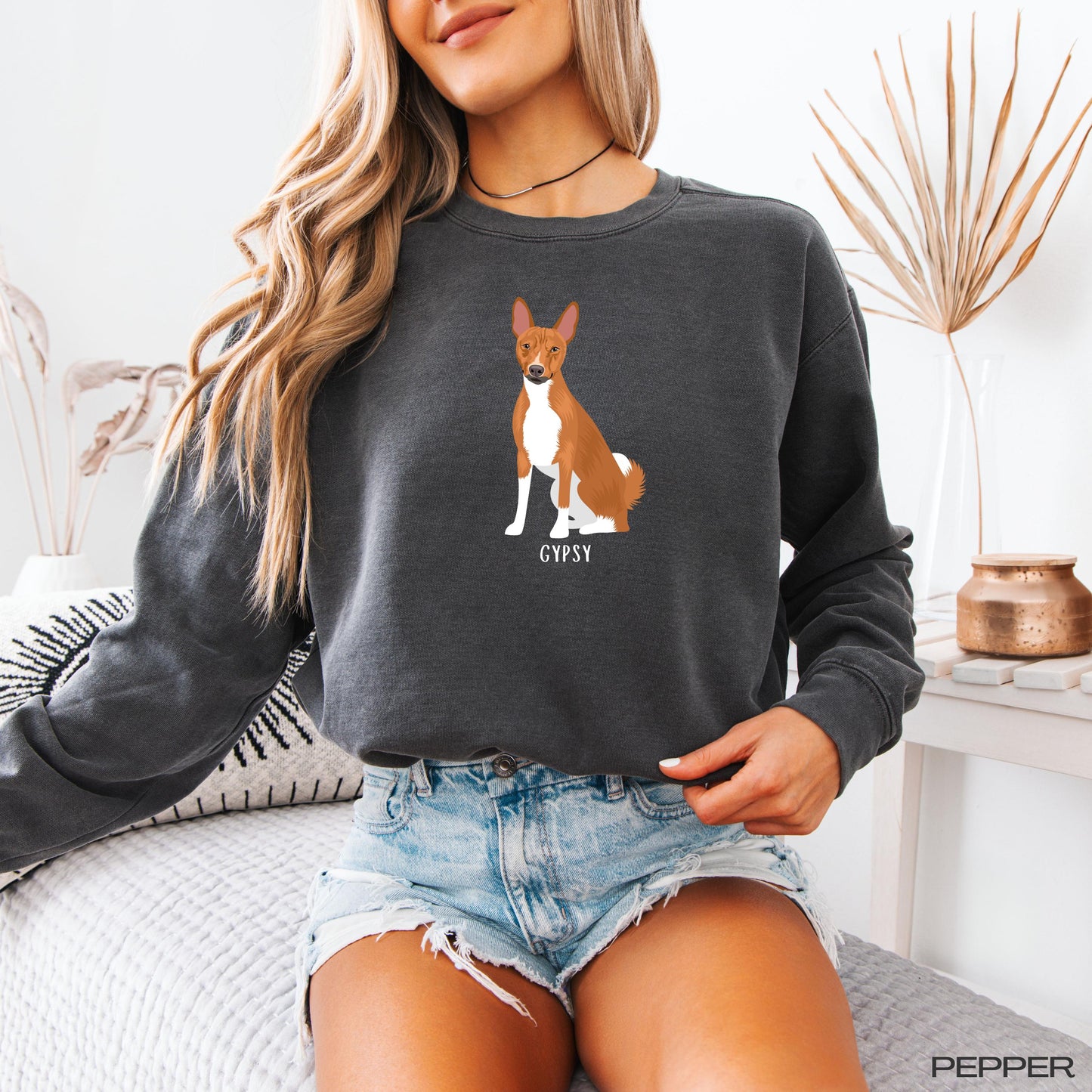 Personalized Basenji Sweatshirt | Basenji Lover Gift worn by a woman with a Basenji design, showcasing its unique charm.