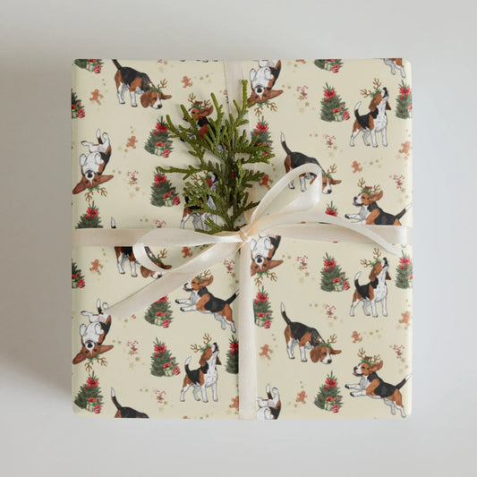 Gift wrapped in Christmas wrapping paper with beagles and Christmas trees on a white background