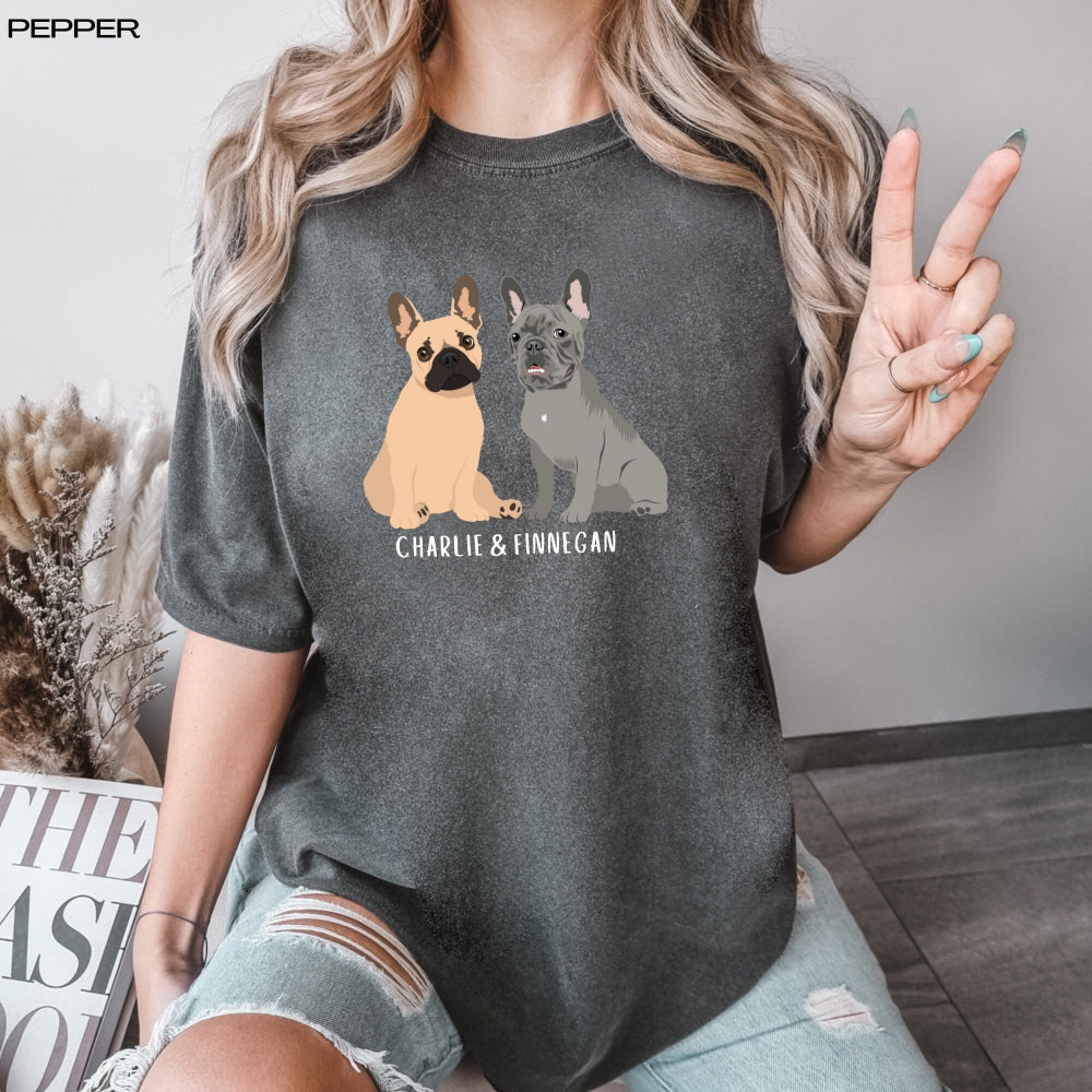 A young woman wearing a personalized French bulldog T-Shhirt with two frenchie graphics and their names