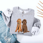 Personalized Goldendoodle mom sweatshirt with a design of a standard Goldendoodle, chocolate doodle and their names beneath the dogs from Love Dogs Gifts dog owner gift store
