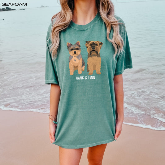 A dog mom wearing a personalized Yorkshire Terrier T-Shirt with two terrier dogs and their names