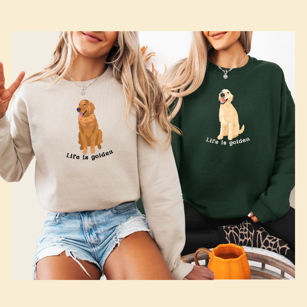 Two woman wearing a sweatshirt with a red golden retriever and  a golden colored retriever with a text "Life is Golden" from Love Dogs Gifts store