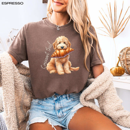 A woman wearing a Goldendoodle croissant shirt