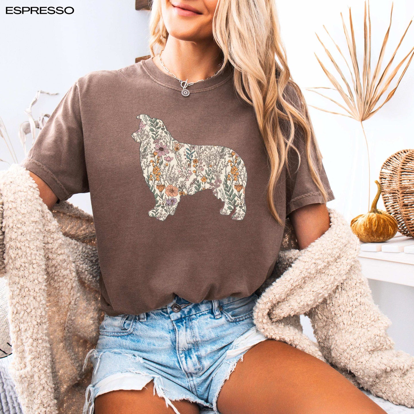 A woman wearing Australian Shepherd dog wildflower shirt