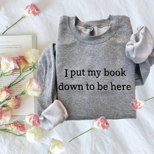 I put my book down to be here sweatshirt embroidered for book lover