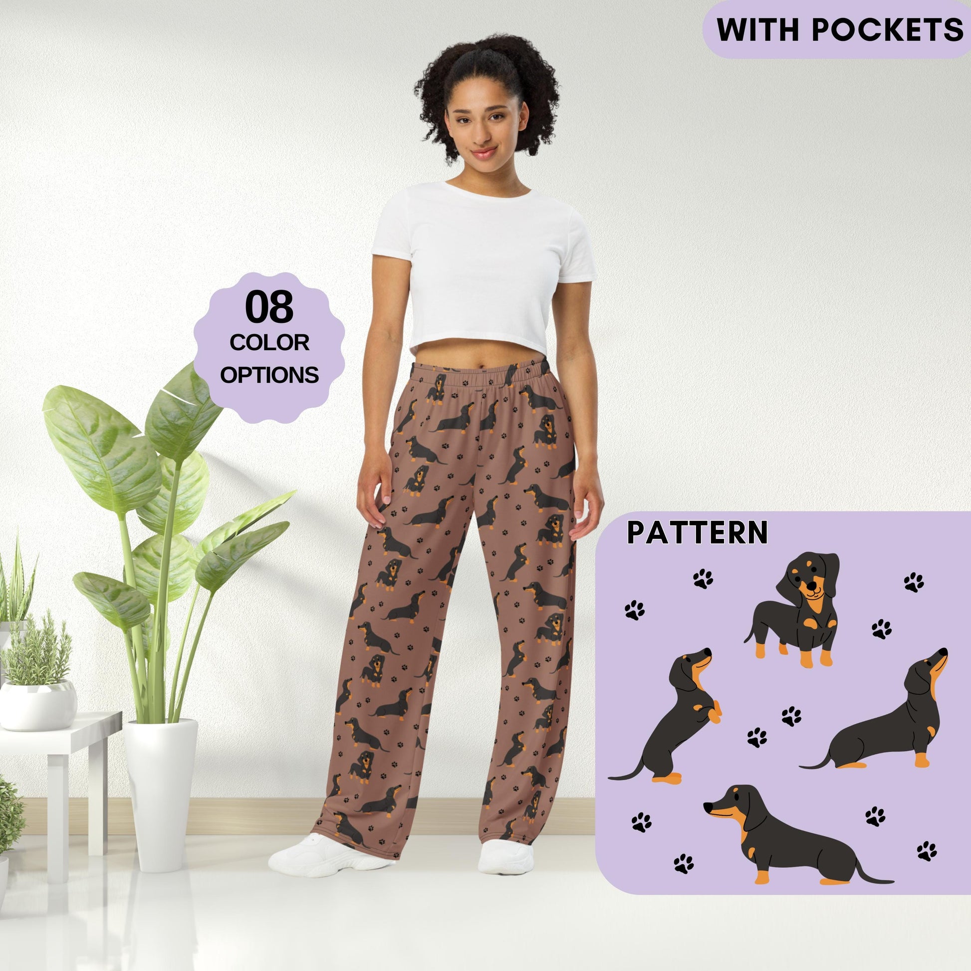 A woman wearing a tan Dachshund pajama pants