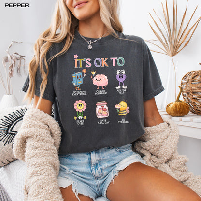 It's Okay To Kids First Grade Teacher Shirt
