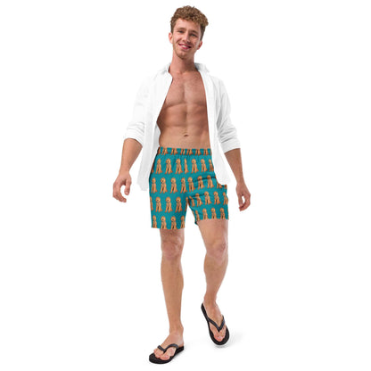 A man wearing a goldendoodle pattern swim trunks