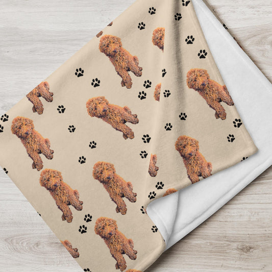 Red Goldendoodle blanket folded on the floor from a flat lay view