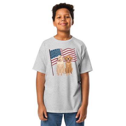 A young boy wearing 4th of July Golden Retriever youth t-shirt in color sports grey.